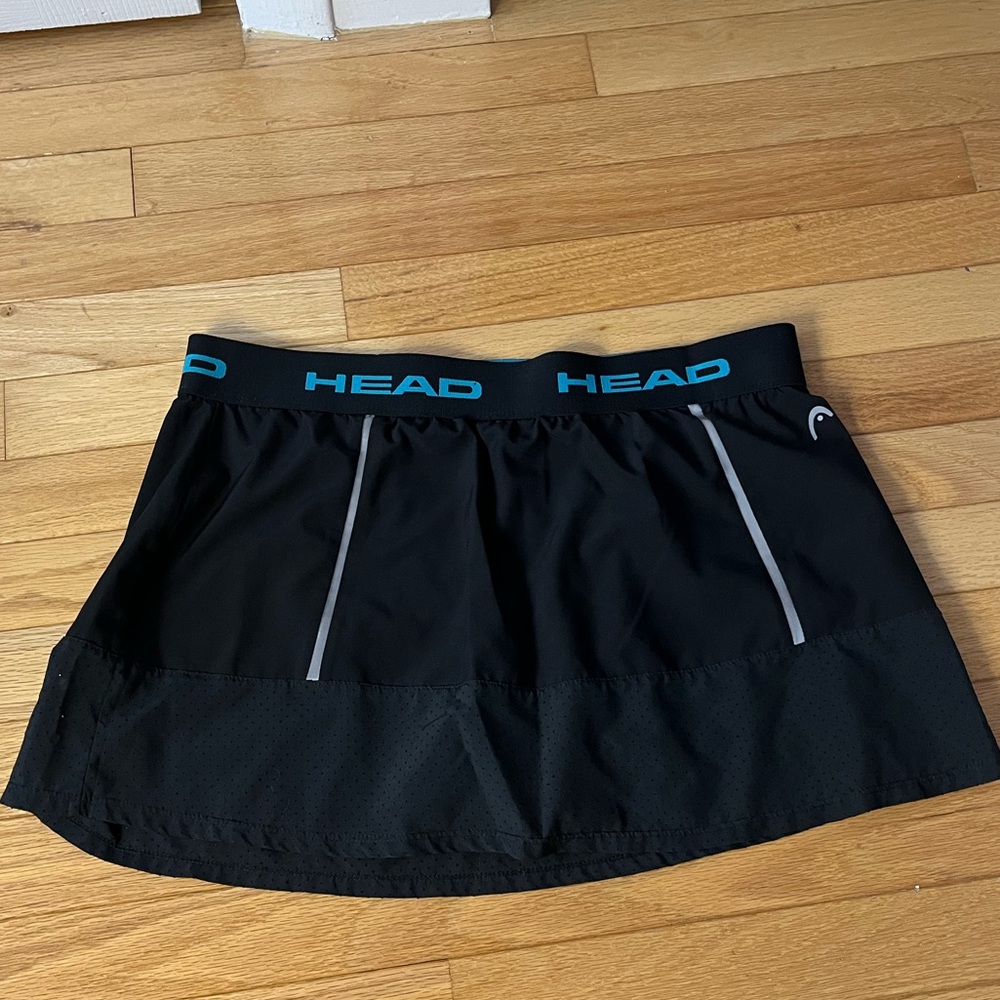 Head tennis or golf skirt in black with booty shorts underneath in size large